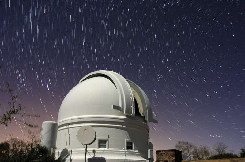 Nighttime long exposure of the open Samuel Oschin Telescope dome at Palomar Observatory in California. Credit: Palomar/Caltech